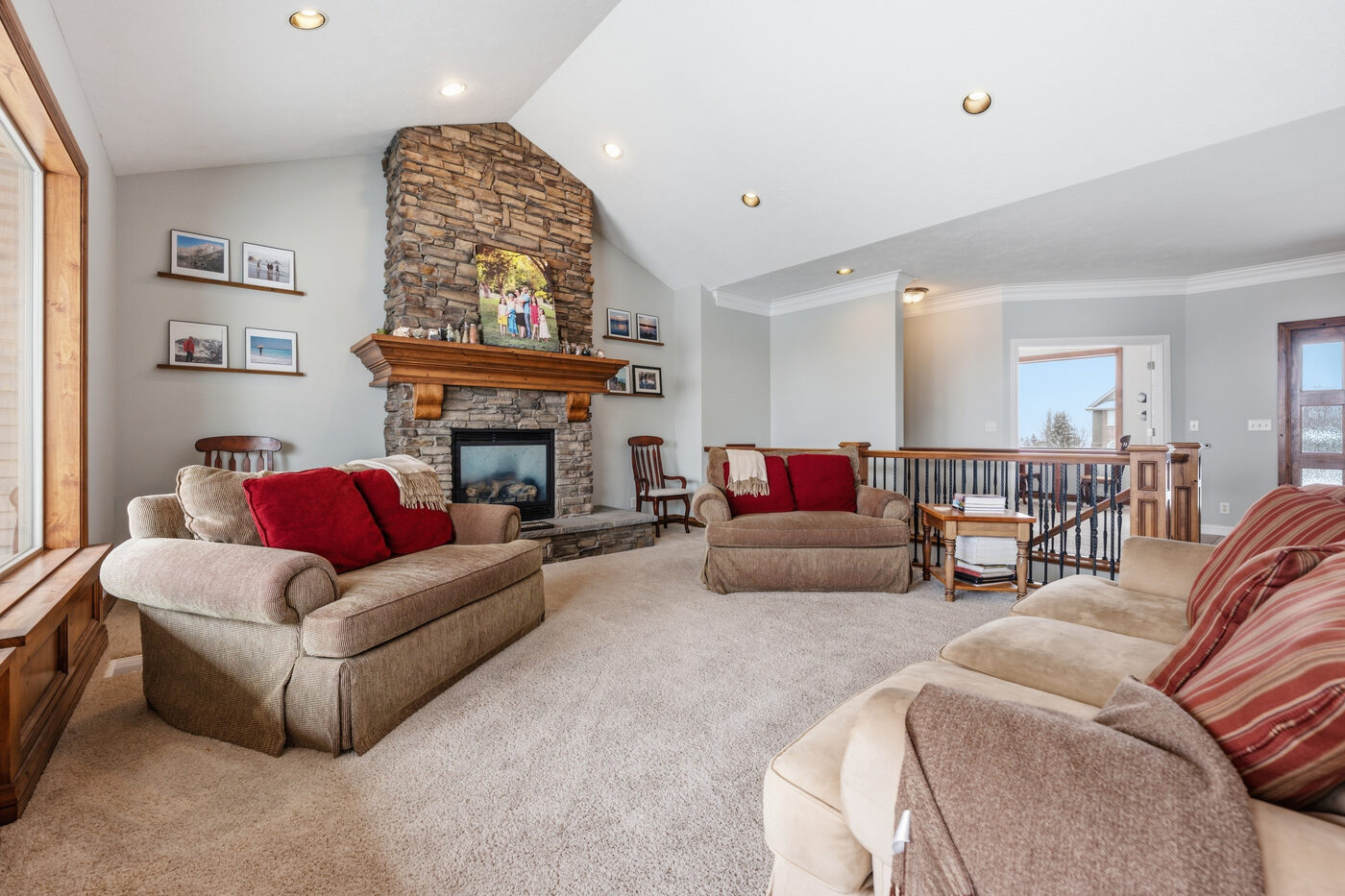 Living room showing full open floor plan and staircase